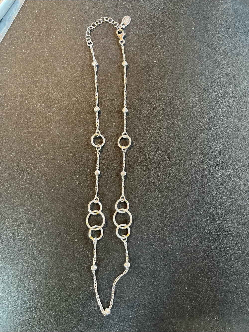 Sterling Silver Frederic Duclos 18” circle design necklace with gold accents.